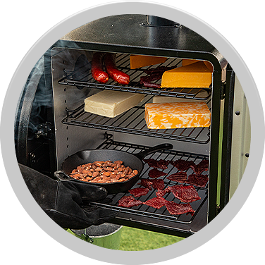 cold smoking - pit boss side smoker attachment filled with cheeses and sausages