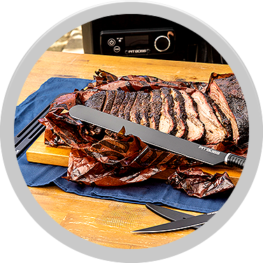 take meat off grill early - sliced brisket on cutting board
