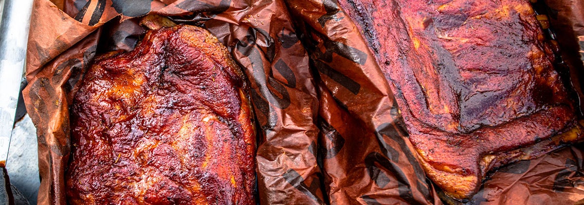 close up of whole cooked ribs on pit boss butcher paper