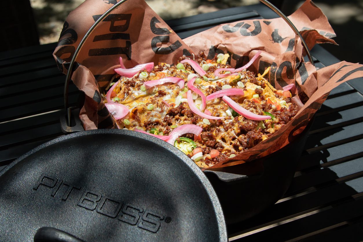 cheesy nachos in pit boss cast iron camp oven summer camping recipe