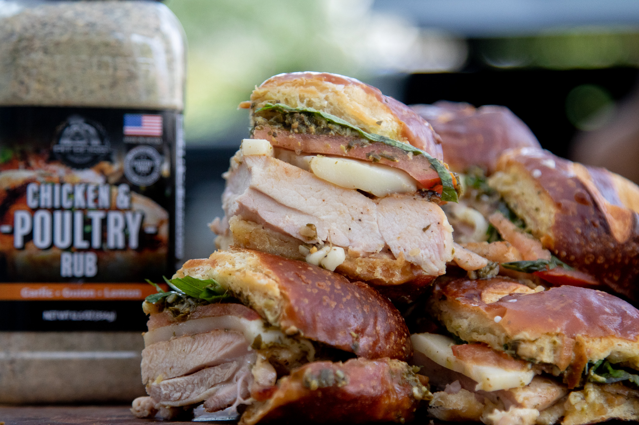 Chicken Pesto Sliders next to Pit Boss chicken and poultry rub