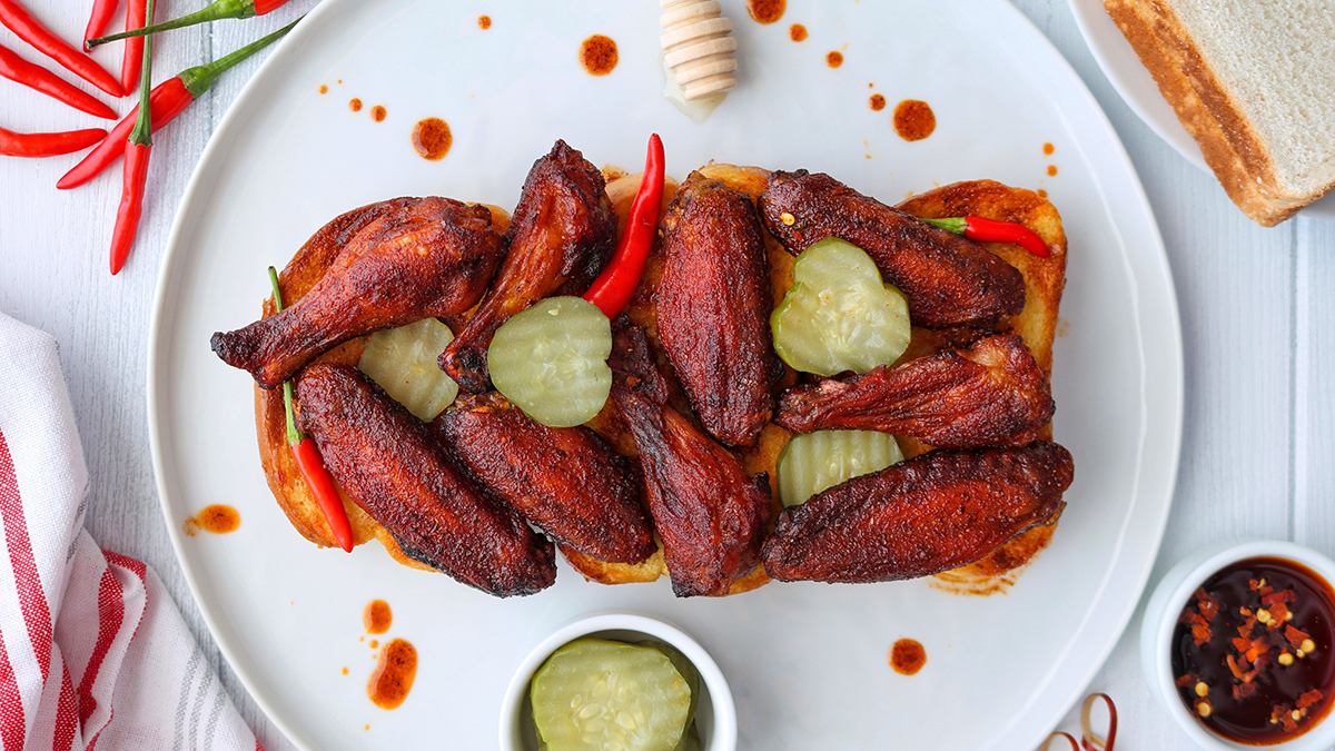 Smoked Wings with honey, pickles and red chili