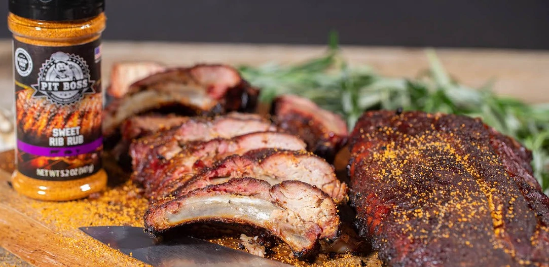 ribs partially separated next to pit boss sweet rib rub