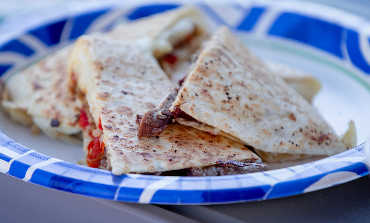 leftover smoked brisket quesadilla cooked on a pit boss flat top gas griddle