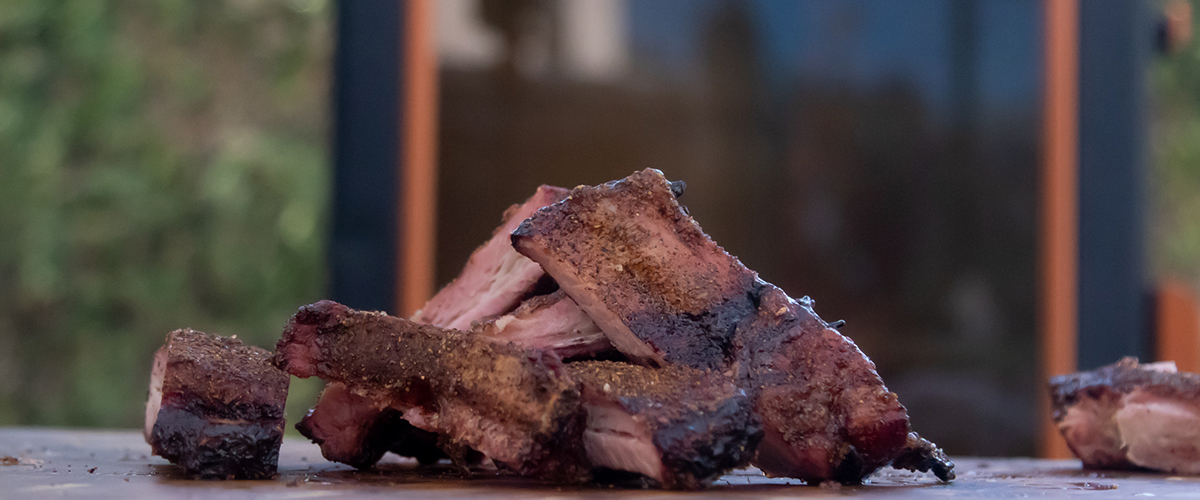 Back ribs with vertical smoker on the back