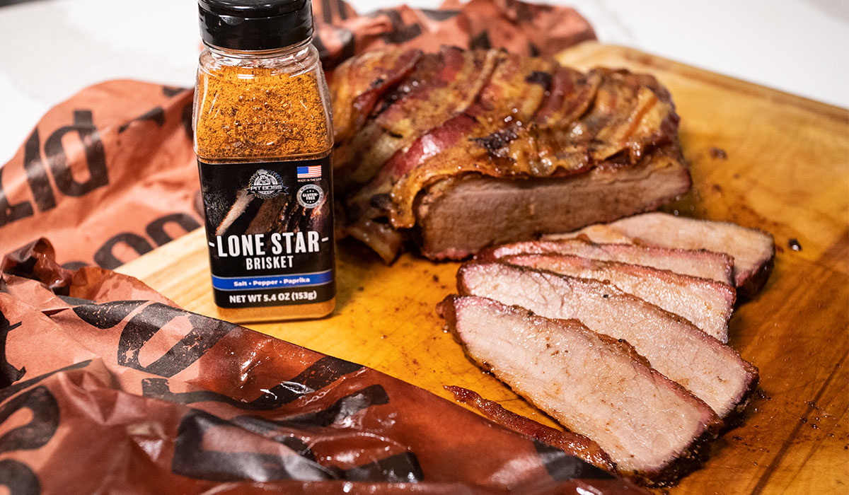 Smoked Brisket with Bacon and a Pit Boss Lonestar Rub Bottle