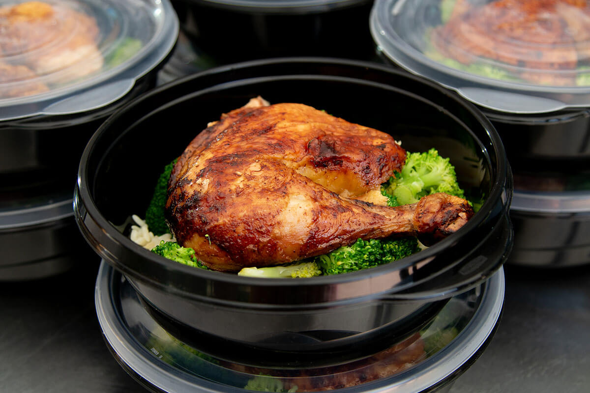 crispy grilled chicken with rice and broccoli in meal prep containers
