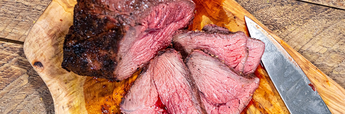 Delicious Grilled Picanha sliced on wood board